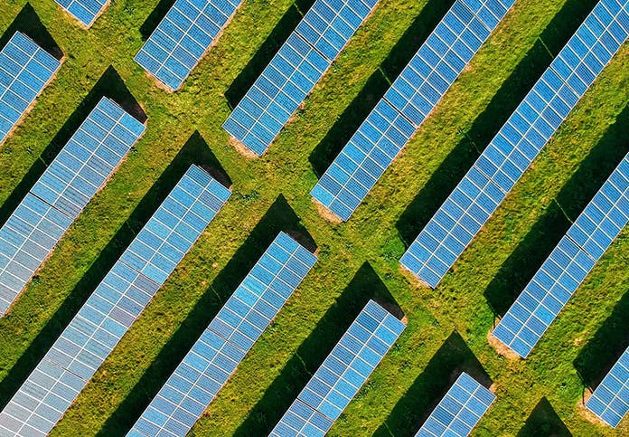 aerial shot of solar power farms